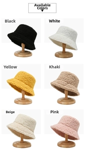 Detailed view of plush lamb wool bucket hats in black, white, yellow, and khaki colors