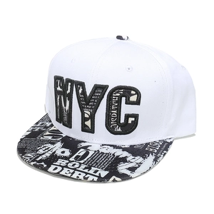 Close-up of NYC embroidery on snapback hat with black and white graffiti pattern brim