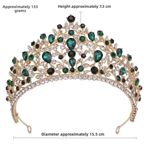 Detail of luxury bridal crown with emerald green gemstones and white zircon crystals
