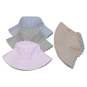Detail view of striped sun hats with breathable eyelets in four different colors