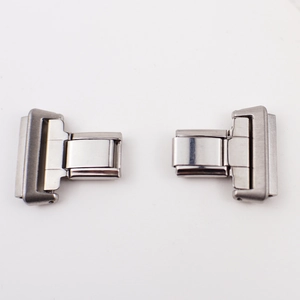 Pair of polished silver stainless steel smart watch strap connectors on a white background