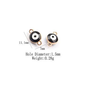 Detail of evil eye connector charms in gold alloy with 11.1x7mm size specifications