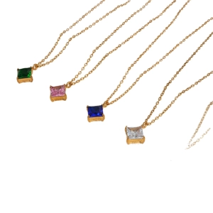 Gold chain necklace set featuring colorful square-cut zircon sugar cube pendants on white background