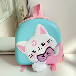 Detail view of cartoon cat hard shell backpack with relief 3D moon and bow design