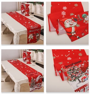 Macro shot of knitted Christmas table runner featuring Santa, reindeer and forest motifs