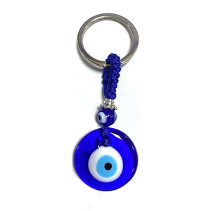 Traditional blue evil eye glass keychain with woven rope and metal ring for luck