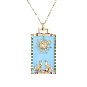 Gold Sun and Moon tarot pendant necklace with blue enamel and colorful gemstones