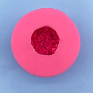 Macro shot showing internal petal texture of pink silicone flower candle mold