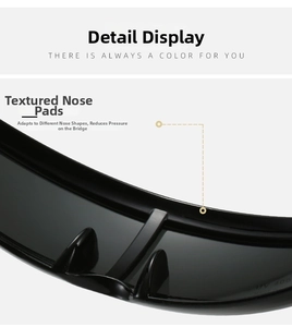 Detail of integrated nose pads and UV400 protection on black wrap sunglasses