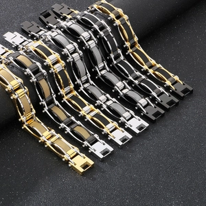 Detail of stainless steel mesh bracelets with industrial links and folding buckles