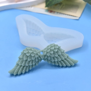Silicone feather wing mold for DIY cake baking and chocolate mousse with green sample