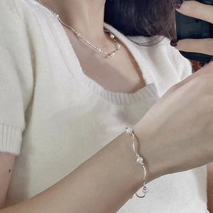 S925 silver necklace and bracelet set with freshwater pearls and wavy metal chain