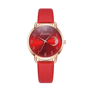 Women's quartz watch with red gradient moon dial and rose gold case on white background