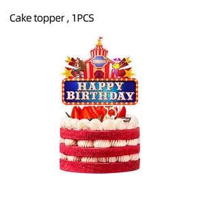 Circus clown and bear theme cake topper with Happy Birthday lettering on strawberry cake