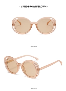 Detail view of oval hollow-out sunglasses in sand brown with 45-degree side angle