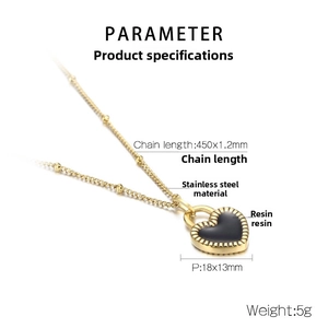 Detail of gold titanium steel necklace with black resin heart pendant and size parameters