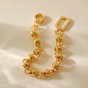 Minimalist gold plated chain bracelet with round bead links and geometric toggle closure