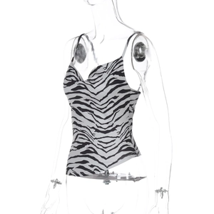 Side view of sexy zebra print camisole with thin straps and a slim fit design