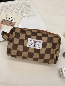 Checkered corduroy makeup bag with brown zipper and portable handle for travel
