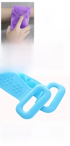 Detail of silicone back scrubber with anti-slip strip handles and soft dense bristles