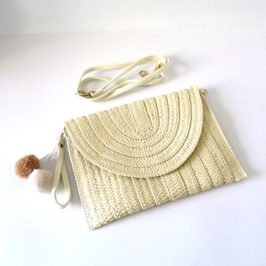 Minimalist paper straw braided envelope clutch bag with pom-pom charm and slim shoulder strap