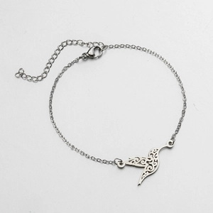Polished stainless steel bracelet with a hollow hummingbird pendant and lobster clasp