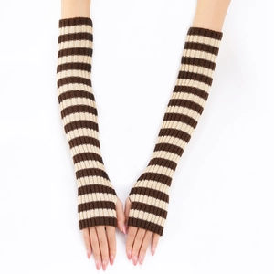 Detail of striped knitted arm warmers in brown and beige with thumb hole design