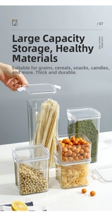 Close-up of food-grade airtight containers with clear bodies and white locking lids