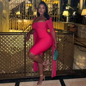 Detail of rose red bodycon dress with off-shoulder neckline and split long sleeves