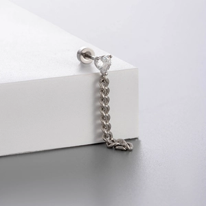 Titanium steel heart crystal earring with drop chain pendant on minimalist background