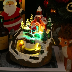 Rotating musical Christmas scene with LED lights and Santa Claus resin decoration