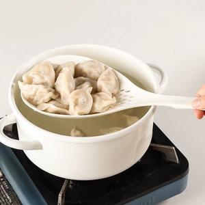 Japanese style long handle skimmer ladle for straining noodles and dumplings from a pot