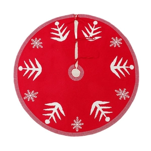 Knitted red Christmas tree skirt with white snowflake patterns and tie closure, 120cm diameter