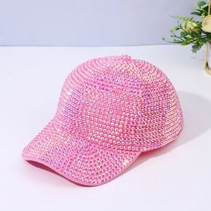 Close-up of sparkling pink rhinestones on a stylish handmade diamond baseball cap