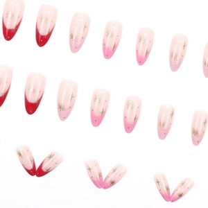 Unghie finte a mandorla con punte French rosse e sfumatura rosa con motivi a stelle