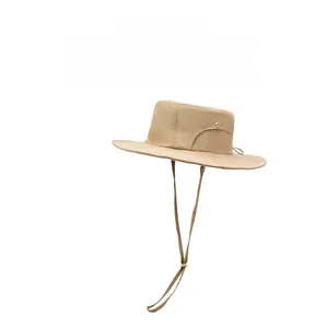 Detail of khaki outdoor sun hat featuring side ventilation eyelets and adjustable chin cord