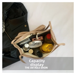 Top view of beige leather tote bag showing large capacity for daily essentials