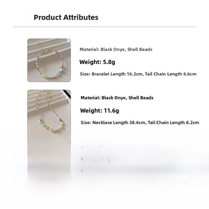 Detail view of hematite and shell bead jewelry set with length and weight measurements