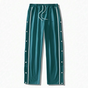 Dark green men's joggers with white side stripes and buttoned side split details