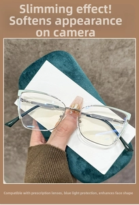 Detail of mint green and silver cat-eye metal frame with anti-blue light lenses