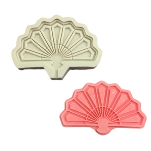 Beige and pink silicone molds for making four Chinese style folding fans for cake decor