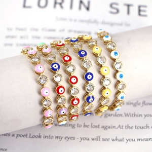 Golden Evil Eye bracelet with colorful enamel beads and micro-set cubic zirconia accents