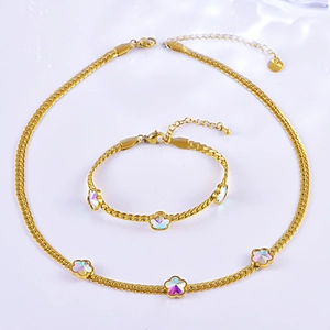 Golden flat snake chain jewelry set with colorful flower charms for women