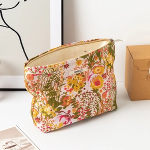 Large capacity floral makeup bag with embossed flower pattern and silver zipper