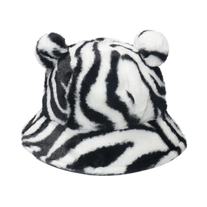Plush faux fur bucket hat with zebra stripes and cute bear ears for winter warmth