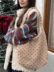 Fuzzy cream tote bag with red polka dots and soft fleece material for winter fashion