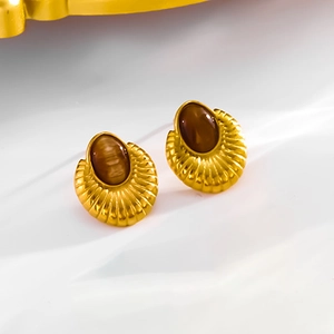 French style teardrop turquoise stud earrings with golden sunburst textured metal frame