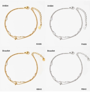 Detail view of multi-layer pearl star anklets and bracelets in gold and silver finishes