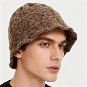 Brown chunky knit bucket hat for women with twist cable pattern and a trendy flared edge