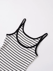 Close-up of black and white striped ribbed knit camisole with thin shoulder straps